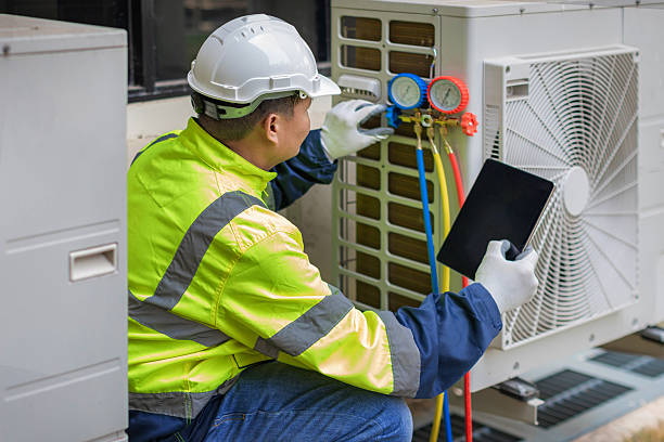 Professional Hvac technician working in Woodhaven, MI